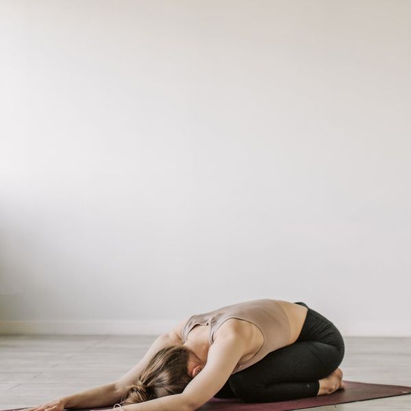 Calm person practicing mindfulness and movement indoors
